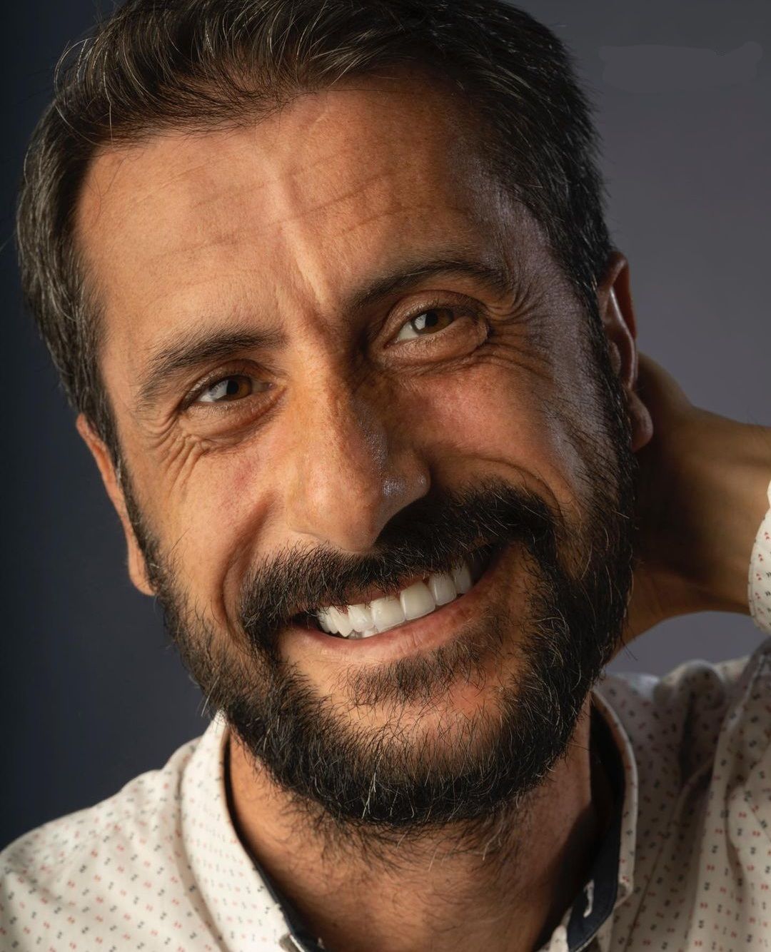 Smiling Man with White Teeth