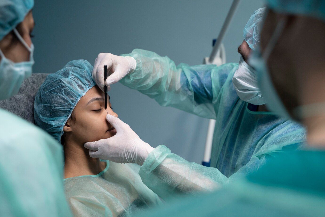 A Lady is being marked before rhinoplasty surgery