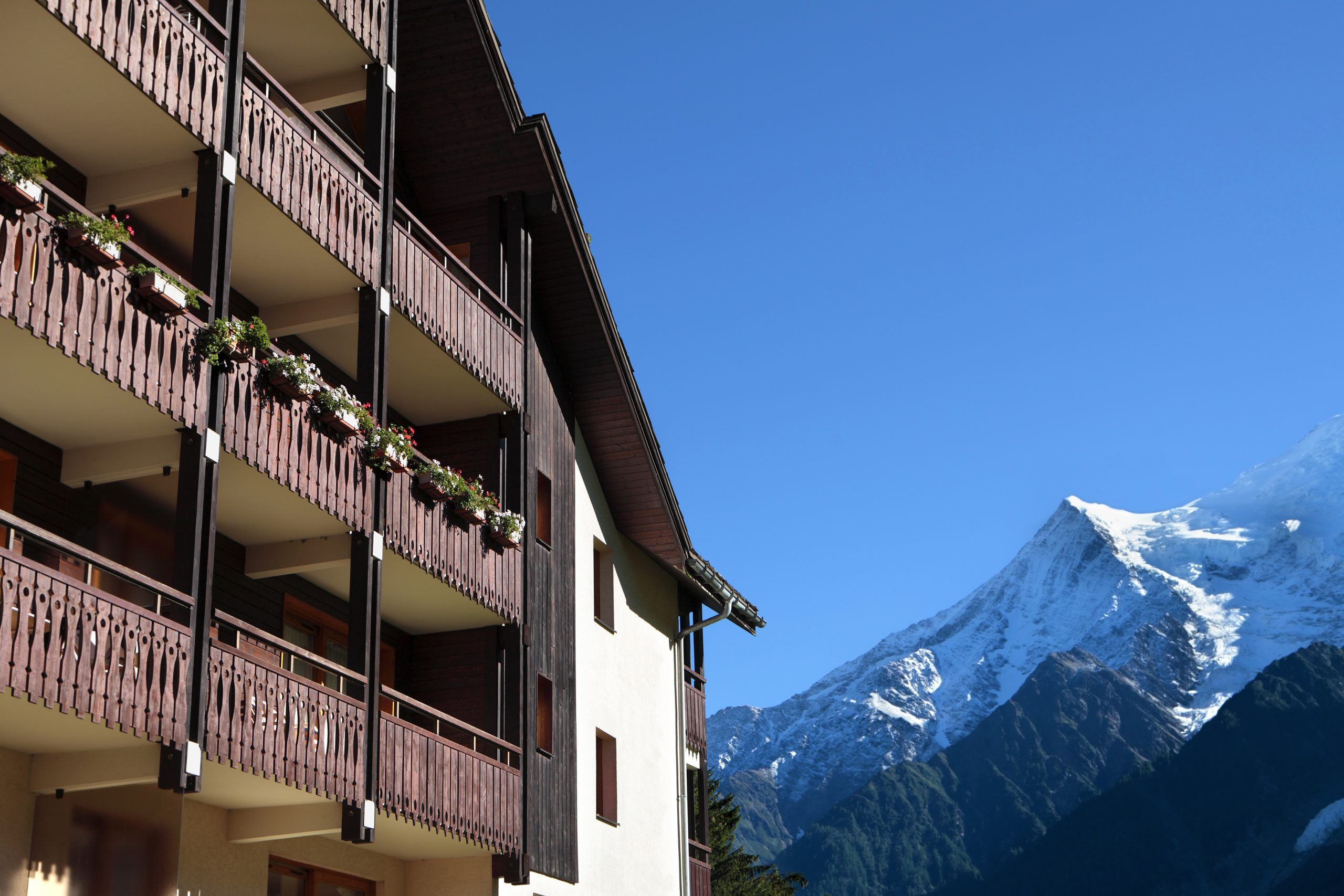 Traditional European Alpine Ski Chalet Hotel, View of the Alps i