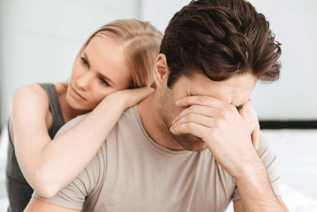 Woman supporting her sad man because he suffers from premature ejeculation