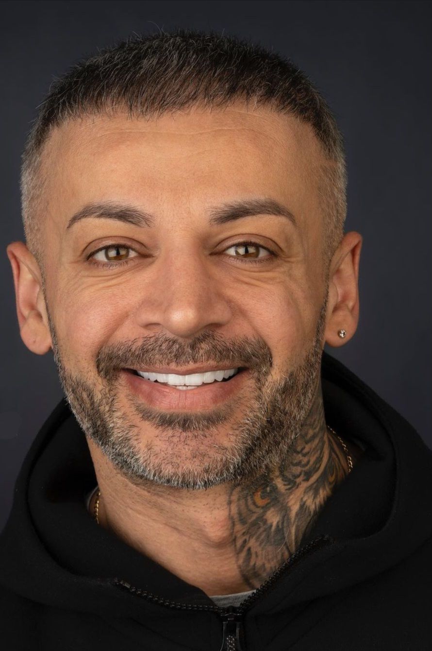 Smiling Man with White Teeth