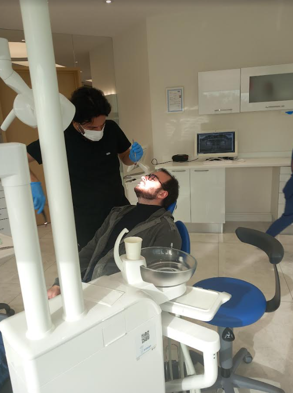 Young man getting examined for dental operations