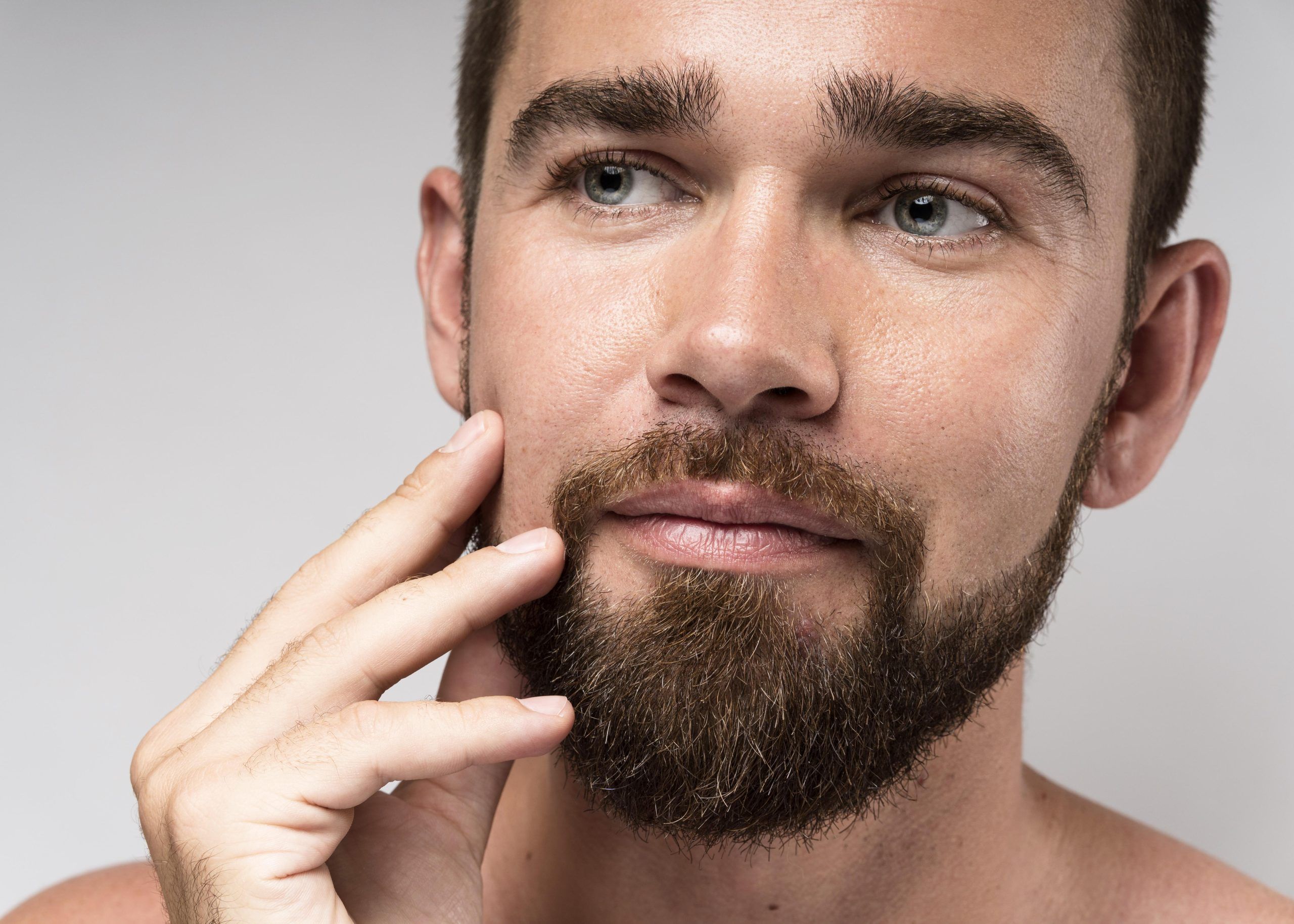 Man touching to his Beard